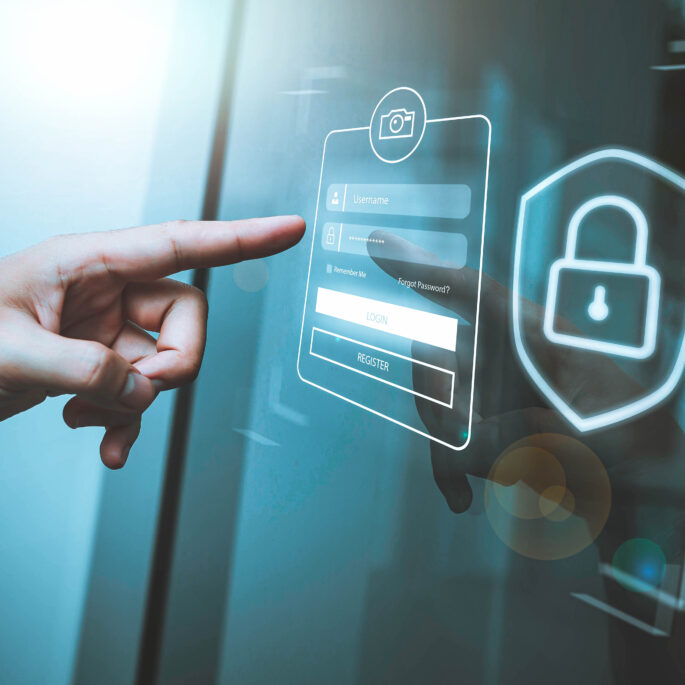 Hand zeigt auf ein virtuelles Login-Fenster mit Benutzernamen- und Passwortfeld sowie einem Symbol für Datensicherheit