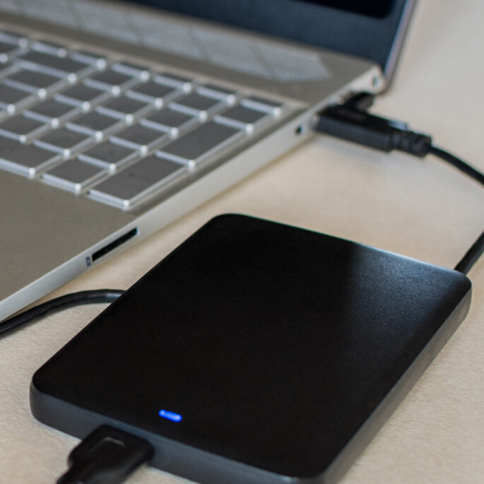 External hard drive connected to a laptop computer 2025 02 06 00 35 00 utc